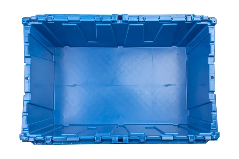 Top view into the empty 2.5-cubic-foot interior of the blue attached-lid crate
